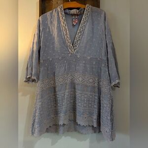 Johnny was kind of a taupe gray color size small can fit med